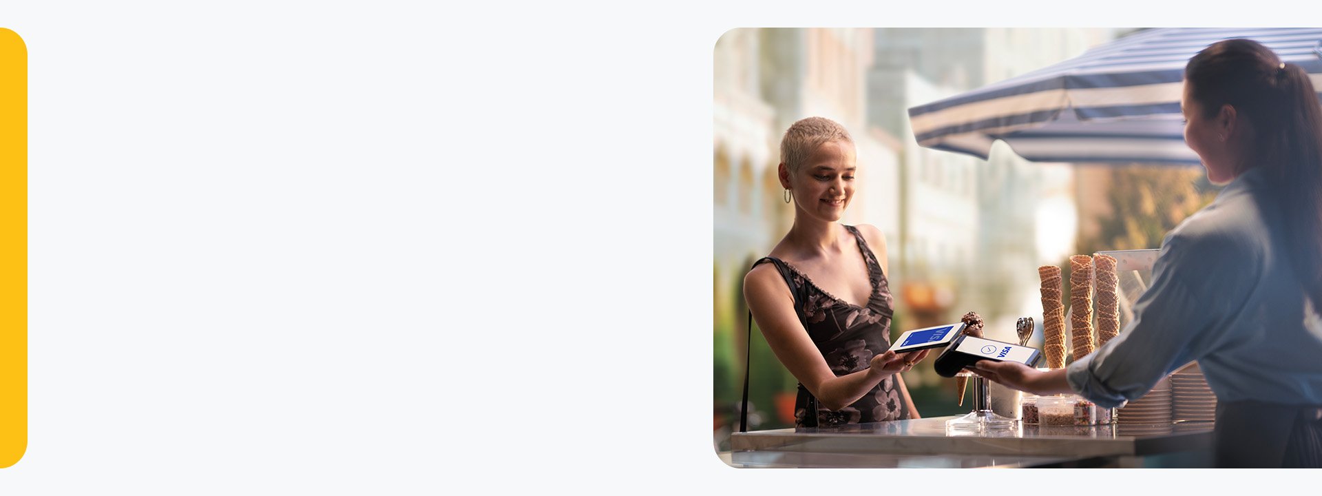 woman paying by phone at restaurant